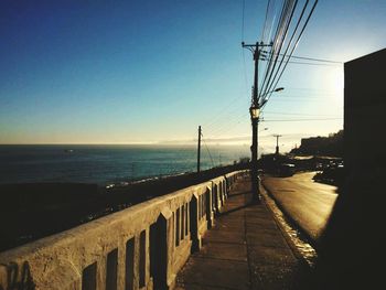 Scenic view of sea against clear sky during sunset