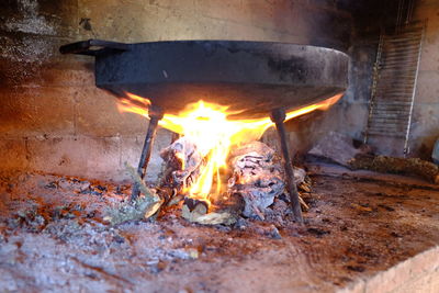 Close-up of fire in container