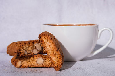 Close-up of coffee cup on table