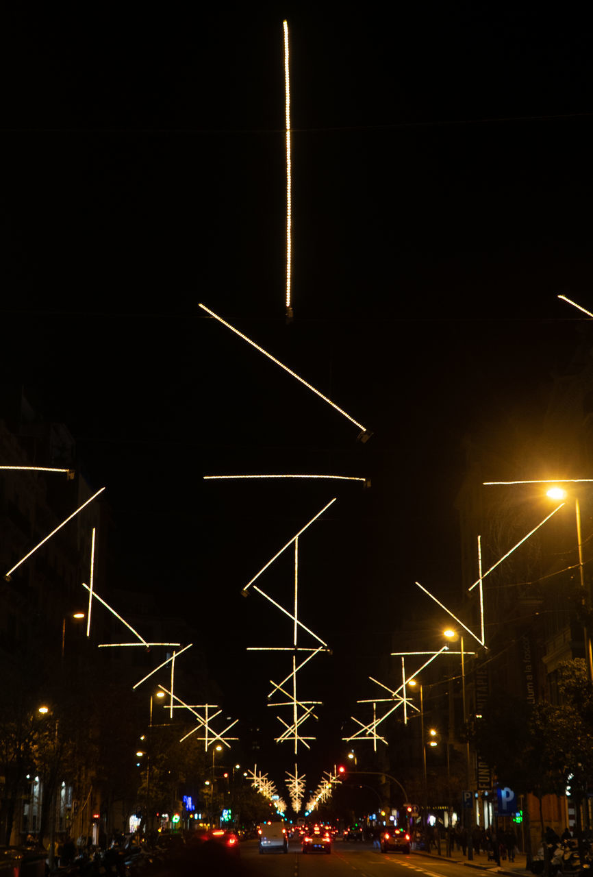 night, illuminated, transportation, architecture, lighting, street light, darkness, no people, street, light, lighting equipment, mode of transportation, city, sky, built structure, outdoors, motion, nature, car, motor vehicle