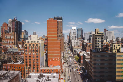 Modern buildings in city against sky