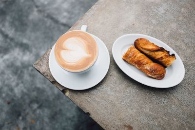 Close-up of cappuccino on table