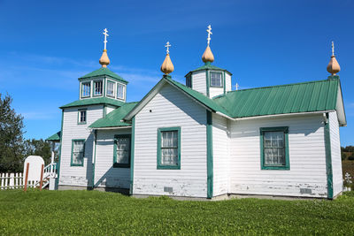 Russian-orthodox church holy assumption of the virgin mary against blue sky