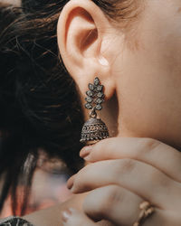 Close-up of woman with tattoo