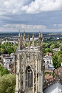 Panoramic view of buildings in city against sky