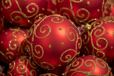 Full frame shot of christmas decoration, red and golden christmas balls family happiness festival