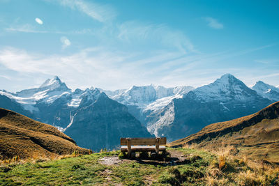 Majestic snowcapped mountain range against sky