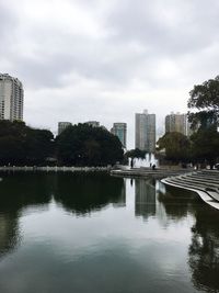 Buildings in city against sky