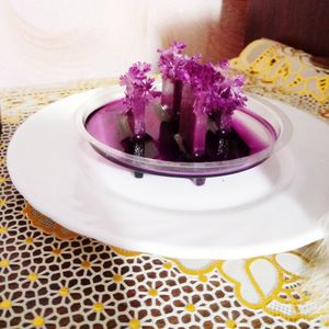 High angle view of purple flowers in plate on table