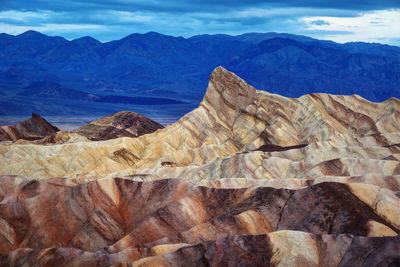 Scenic view of rocky mountains against sky