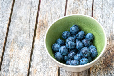 High angle view of fruits in bowl on table