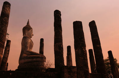 Statue of temple against sky