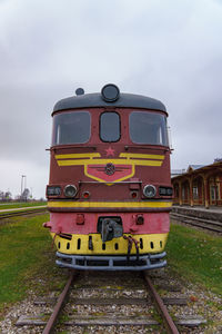 Train on railroad track against sky