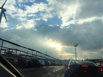 Cars on highway against sky