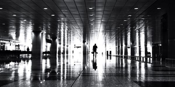 Silhouette of woman in corridor