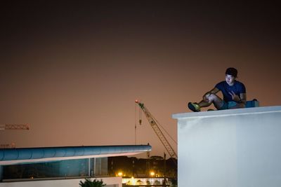 Woman standing in container