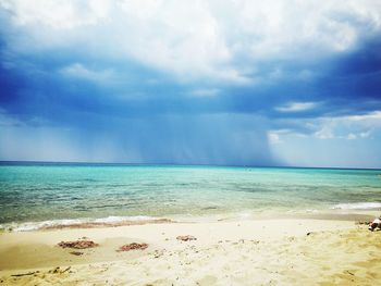 Scenic view of beach against sky