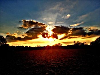 Scenic view of silhouette against sky during sunset