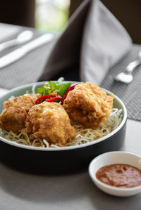 Close-up of food in plate on table