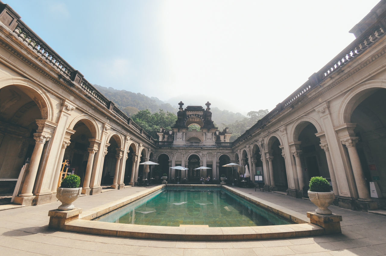 VIEW OF SWIMMING POOL IN THE BACKGROUND