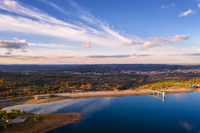 Drone aerial panoramic view of sabugal dam lake reservoir with perfect reflection, in portugal