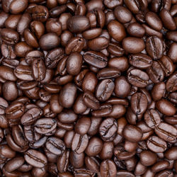 Close up shot of brown roast coffee texture background