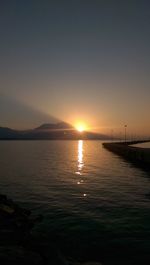 Scenic view of sea at sunset