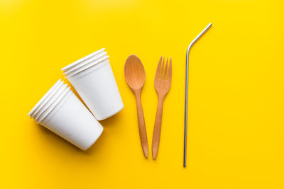 High angle view of yellow pencils on table