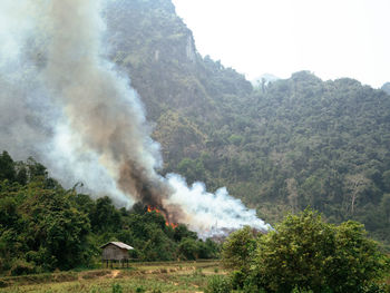 Smoke emitting from volcanic mountain