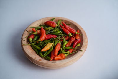 Close-up of salad in bowl against white background