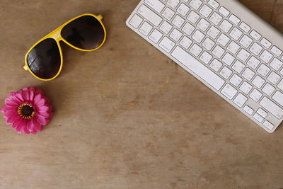 Directly above shot of red and laptop on table