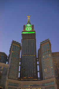 Low angle view of skyscrapers against clear sky