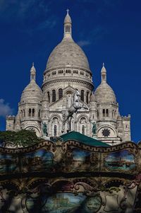 View of historical building against cloudy sky