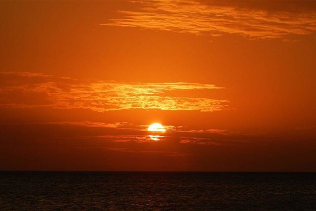 sunset, sea, horizon over water, orange color, scenics, water, sun, beauty in nature, tranquil scene, tranquility, sky, waterfront, idyllic, nature, seascape, cloud - sky, silhouette, cloud, outdoors, reflection