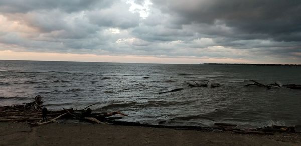 Scenic view of sea against sky at sunset