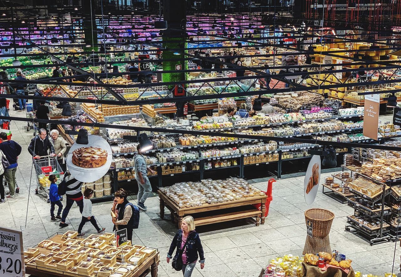 GROUP OF PEOPLE AT STORE