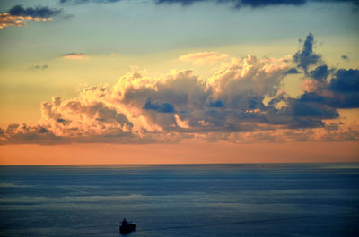 Scenic view of sea at sunset