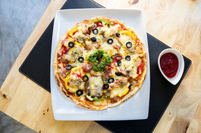 High angle view of pizza on table