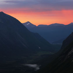 Scenic view of mountains against sky during sunset