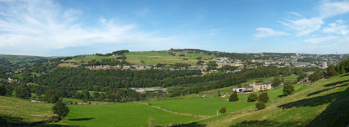 Panoramic view of landscape and buildings against sky