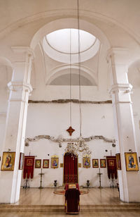 Low angle view of chandelier hanging in building