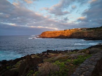 Scenic view of sea against sky during sunset