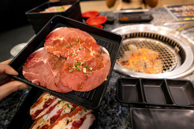 High angle view of food on barbecue grill