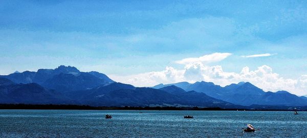 Scenic view of sea against cloudy sky