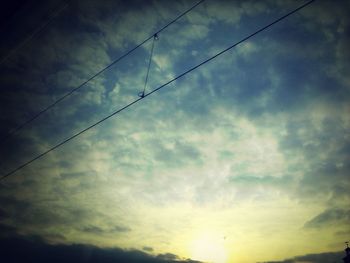 Low angle view of cloudy sky at sunset