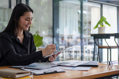Businesswoman working at office