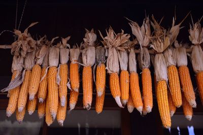 High angle view of sweetcorn for sale at market stall