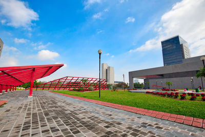 View of buildings against cloudy sky