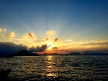 Scenic view of sea at sunset