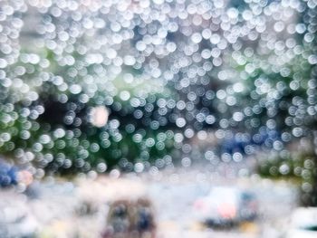 Defocused image of water drops on sunny day